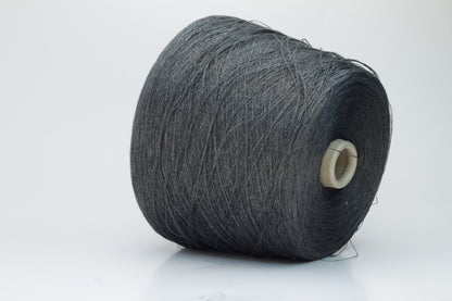 Close-up of a neatly wound skein of fine, smooth brownish-grey linen yarn, exhibiting subtle natural slub variations and a gentle matte sheen.