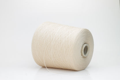 Close-up of luxurious Beige Merino wool yarn, two-ply twist with a soft, subtle sheen, and fine, consistent thread structure.