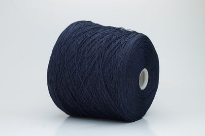 Close-up of pristine Navy linen and viscose blend yarn, softly twisted with a subtle sheen, showcasing its fine, smooth texture.