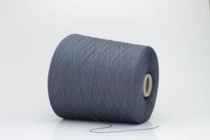 Close-up of luxurious Dark Gray Merino wool yarn, two-ply twist with a soft, subtle sheen, and fine, consistent thread structure.
