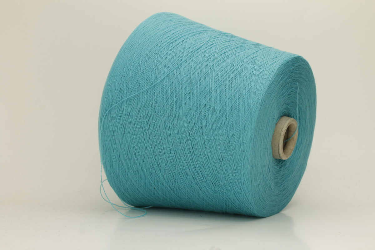 Close-up of a vibrant bright turquoise cashmere yarn hank, showcasing its fine, soft 2-ply twist and subtle, luxurious sheen.