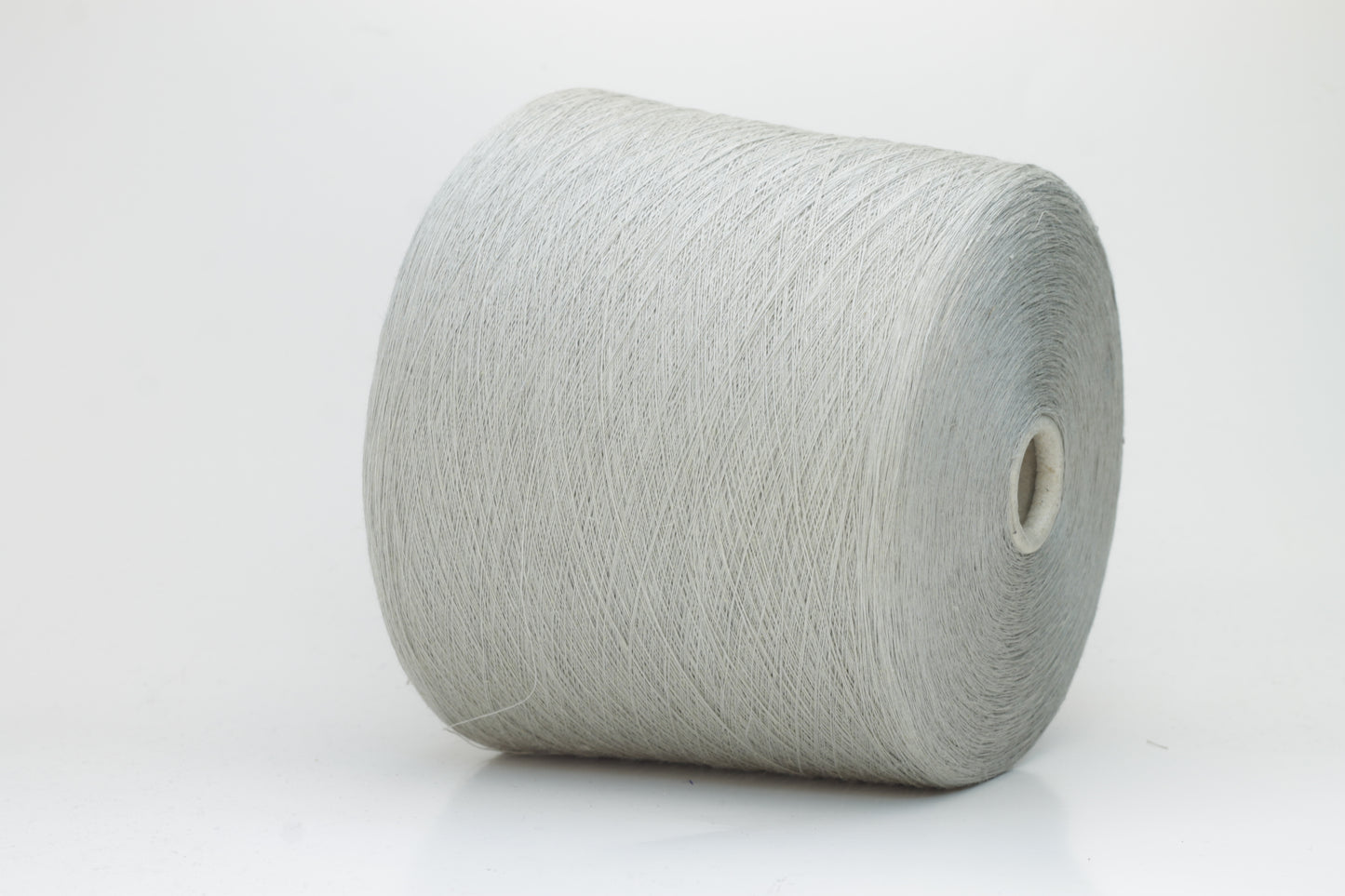 Fine, single-ply linen yarn in a rich Silver. Reveals a crisp texture and subtle natural sheen, typical of pure linen fiber.