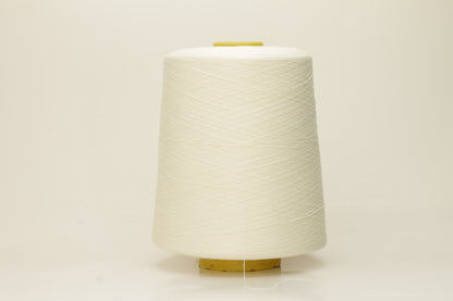 Close-up of pristine white, finely twisted silk yarn, showcasing its luminous sheen and smooth, consistent texture. The individual plies are barely discernible due to its delicate, high-count spin, reflecting light beautifully.