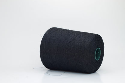 Fine, single-ply linen yarn in a Black. Reveals a crisp texture and subtle natural sheen, typical of pure linen fiber.