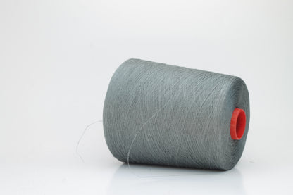 Fine, single-ply linen yarn in a rich Cannone. Reveals a crisp texture and subtle natural sheen, typical of pure linen fiber.