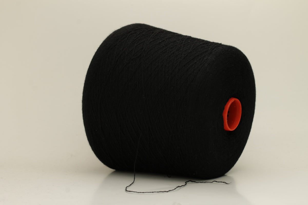 Rich, deep black 2-ply yarn with a fine, smooth twist; exhibits a subtle sheen and incredibly soft, uniform texture.
