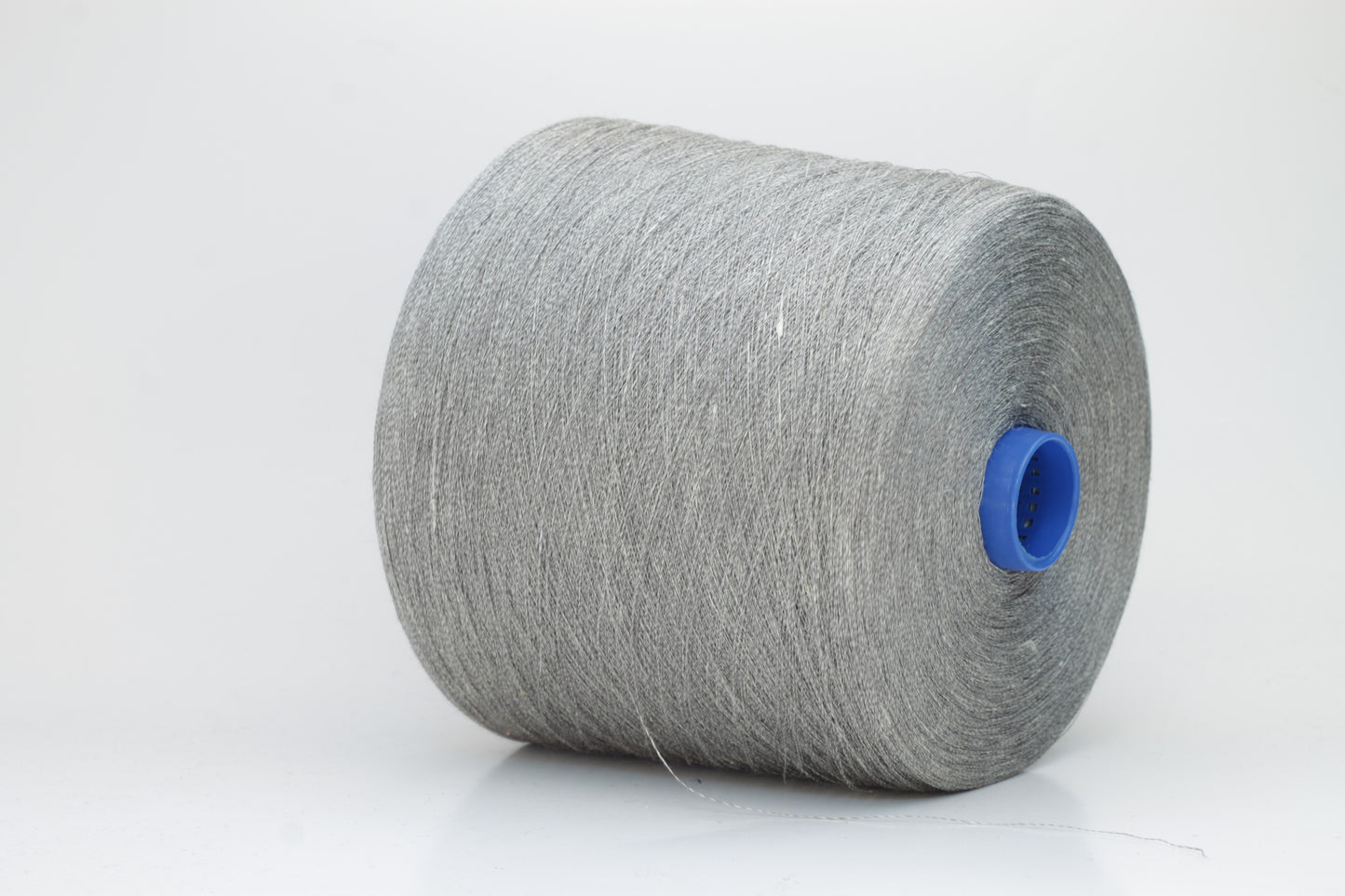 Fine, single-ply linen yarn in a rich charcoal gray. Reveals a crisp texture and subtle natural sheen, typical of pure linen fiber.