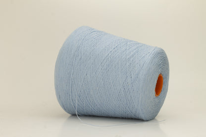 Close-up of a luxurious, soft Atlantic blue 2-ply cashmere yarn, subtly twisted with a delicate sheen and rich, deep color saturation.