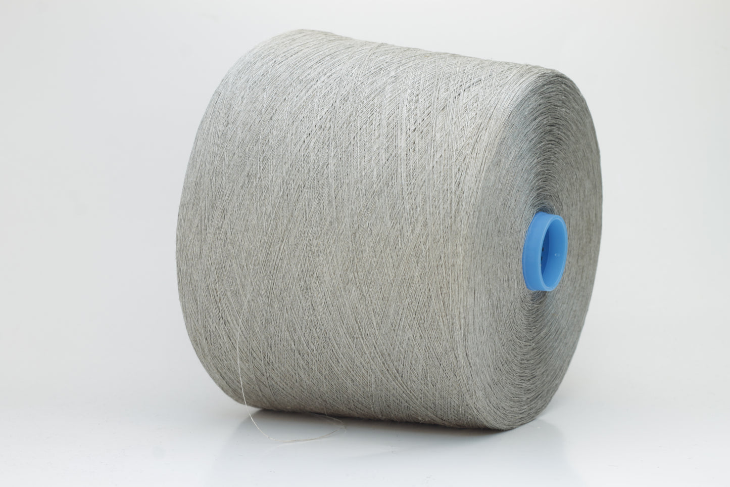 Fine, single-ply linen yarn in a rich charcoal gray. Reveals a crisp texture and subtle natural sheen, typical of pure linen fiber.