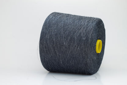 Fine, single-ply linen yarn in a rich Storm Gray. Reveals a crisp texture and subtle natural sheen, typical of pure linen fiber.