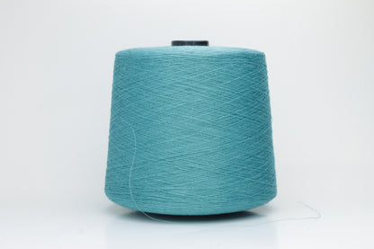 Fine, single-ply linen yarn in a Turquoise. Reveals a crisp texture and subtle natural sheen, typical of pure linen fiber.