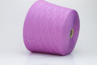 Close-up image showcasing a vibrant purple 100% merino yarn skein with a slight twist, revealing the fine ply structure and rich color depth; the fiber appears fluffy and soft.