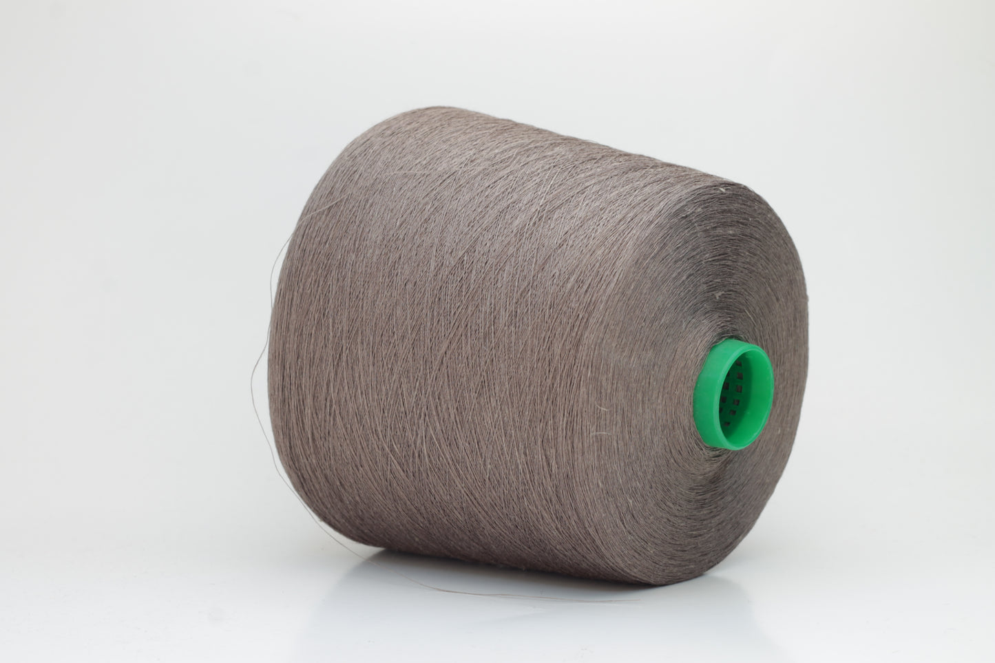 Fine, single-ply linen yarn in a rich Talpa. Reveals a crisp texture and subtle natural sheen, typical of pure linen fiber.