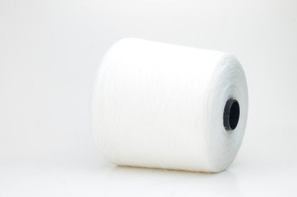 Fine, single-ply linen yarn in a rich White. Reveals a crisp texture and subtle natural sheen, typical of pure linen fiber.