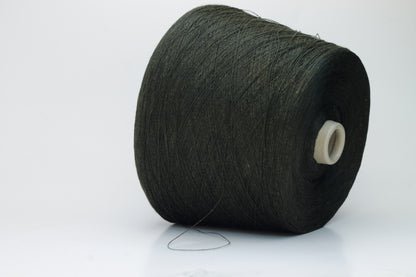 Two plies of earthy Cicoria brown linen yarn, tightly twisted with visible fibers, showcasing natural slubs and a subtle, sophisticated sheen.