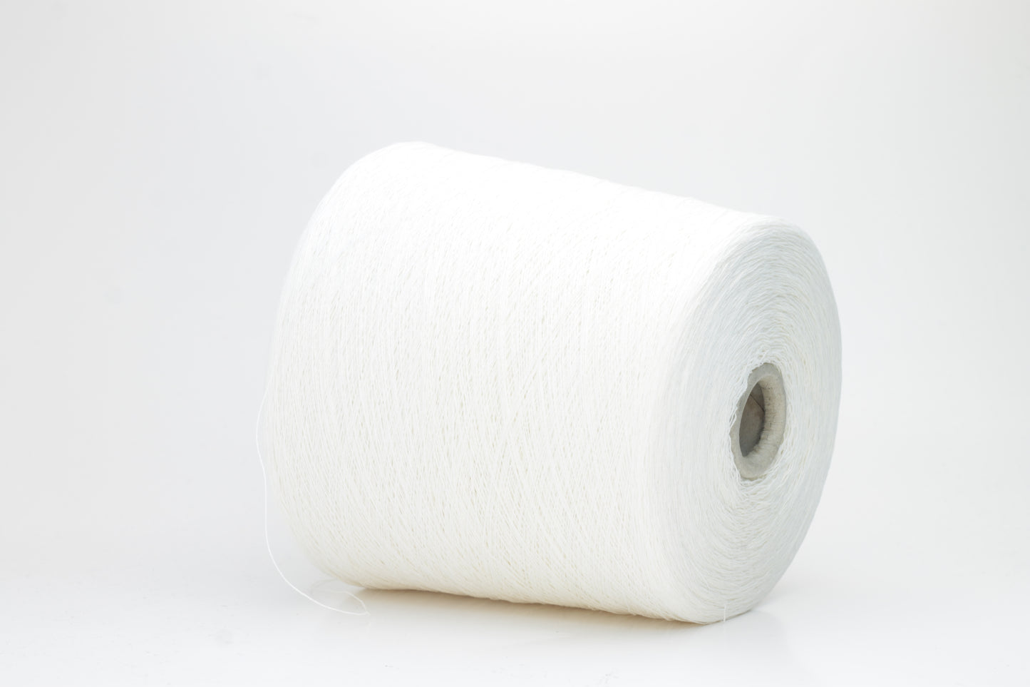 A soft white three-ply linen yarn, tightly twisted with a subtle natural sheen, presented in a neatly wound skein, showcasing its crisp, cool texture.