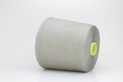 Fine, single-ply linen yarn in a rich Naturale. Reveals a crisp texture and subtle natural sheen, typical of pure linen fiber.