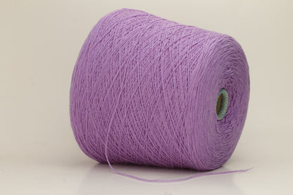 Vivid royal purple cashmere yarn, softly coiled, showcasing its fine 6-ply twist and subtle lustrous sheen, ideal for luxury textiles.