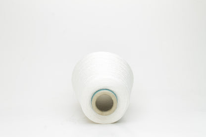 Close-up of a skein of lustrous, pure white silk yarn, tightly plied with a smooth, radiant finish, reflecting light softly.