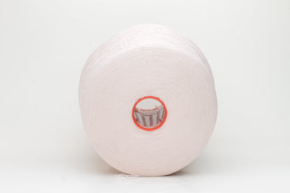 Close-up of a smooth, twisted, three-ply premium nylon yarn in a soft, elegant rose pink shade, exhibiting a subtle sheen and consistent strand structure.