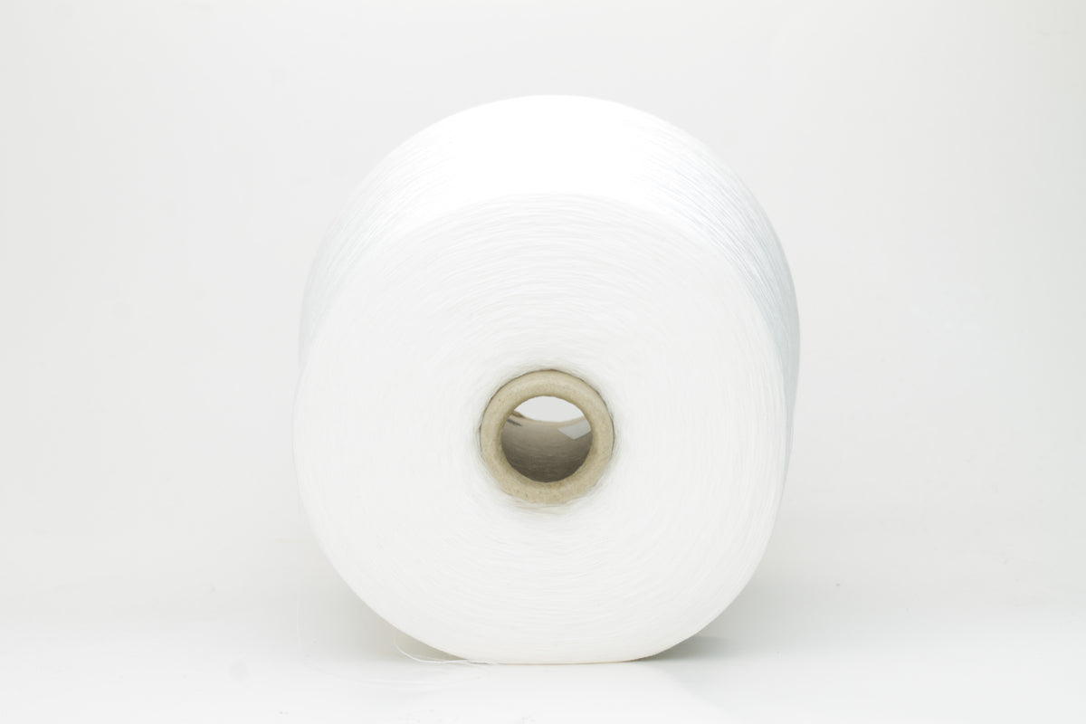 A pristine skein of bright pure white, two-ply cotton yarn, featuring a smooth, uniform twist and a subtle, sophisticated sheen.