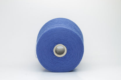 Close-up of luxurious petrol blue Merino wool yarn, two-ply twist with a soft, subtle sheen, and fine, consistent thread structure.
