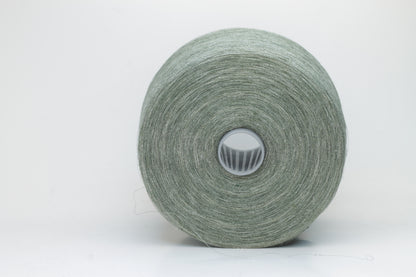 Fine, single-ply linen yarn in a rich Sage Green. Reveals a crisp texture and subtle natural sheen, typical of pure linen fiber.