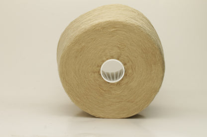 Luxurious, pristine Beige single-ply silk yarn with a smooth, uniform texture and a delicate sheen, softly coiled.