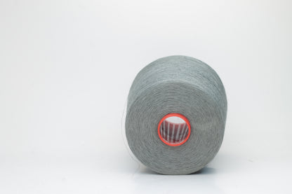 Fine, single-ply linen yarn in a rich Cannone. Reveals a crisp texture and subtle natural sheen, typical of pure linen fiber.