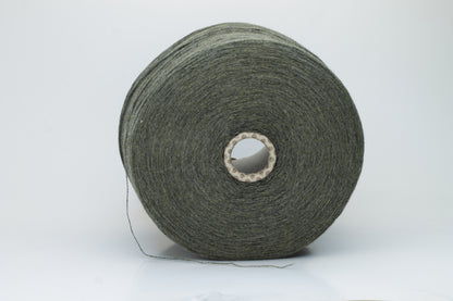 Close-up of a skein of luxurious 100% cashmere yarn in a deep Borneo brown, showcasing its soft, slightly matte sheen and subtle halo.