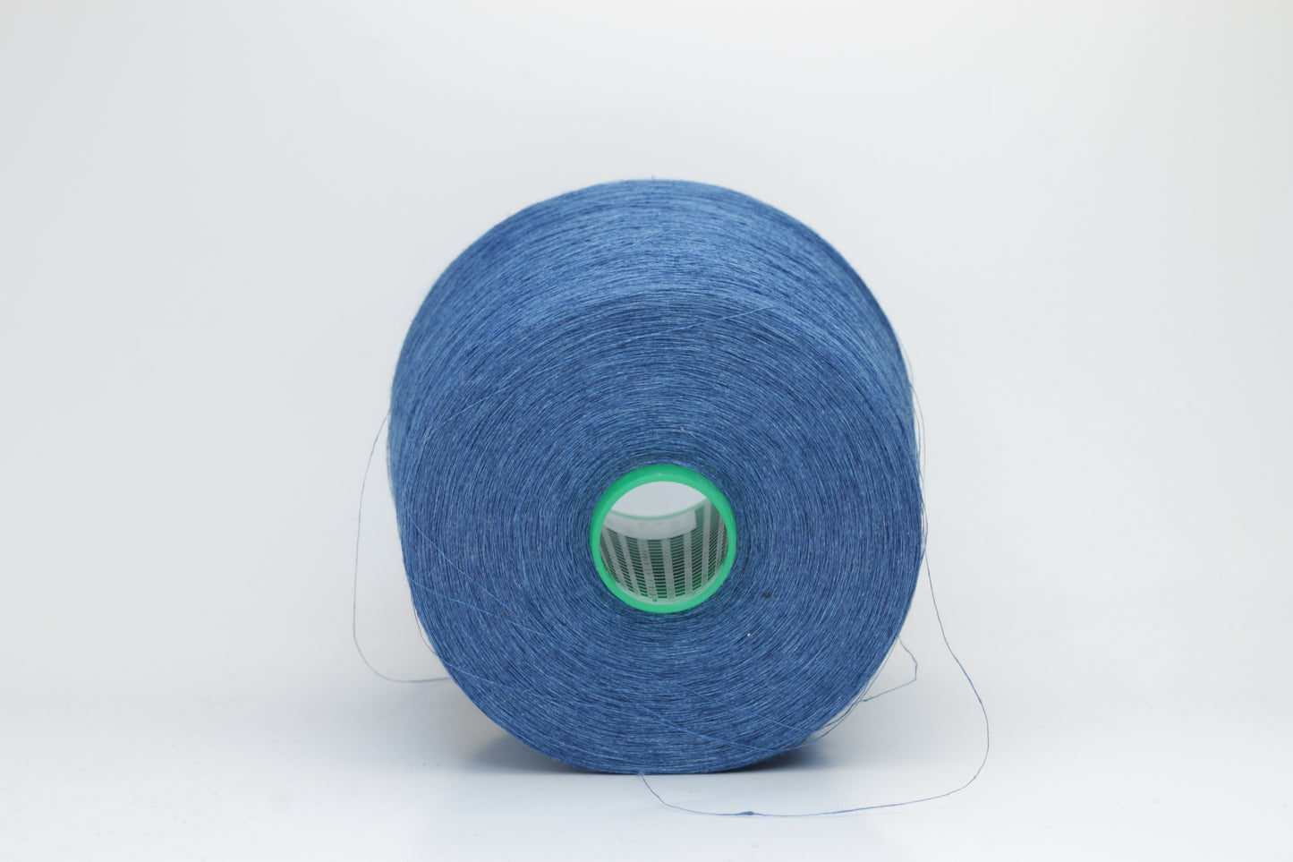 Fine, single-ply linen yarn in a rich Blue. Reveals a crisp texture and subtle natural sheen, typical of pure linen fiber.
