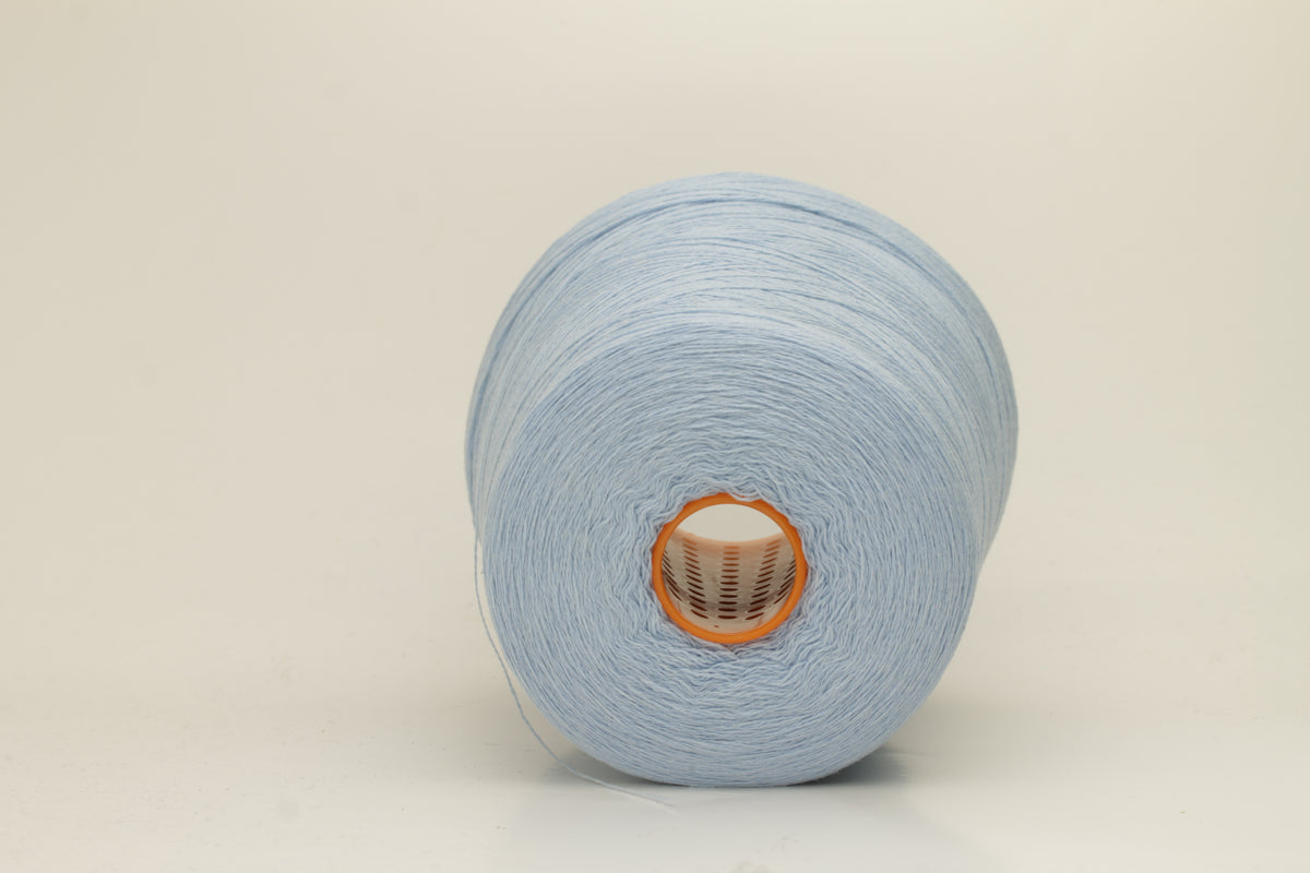 Close-up of a luxurious, soft Atlantic blue 2-ply cashmere yarn, subtly twisted with a delicate sheen and rich, deep color saturation.