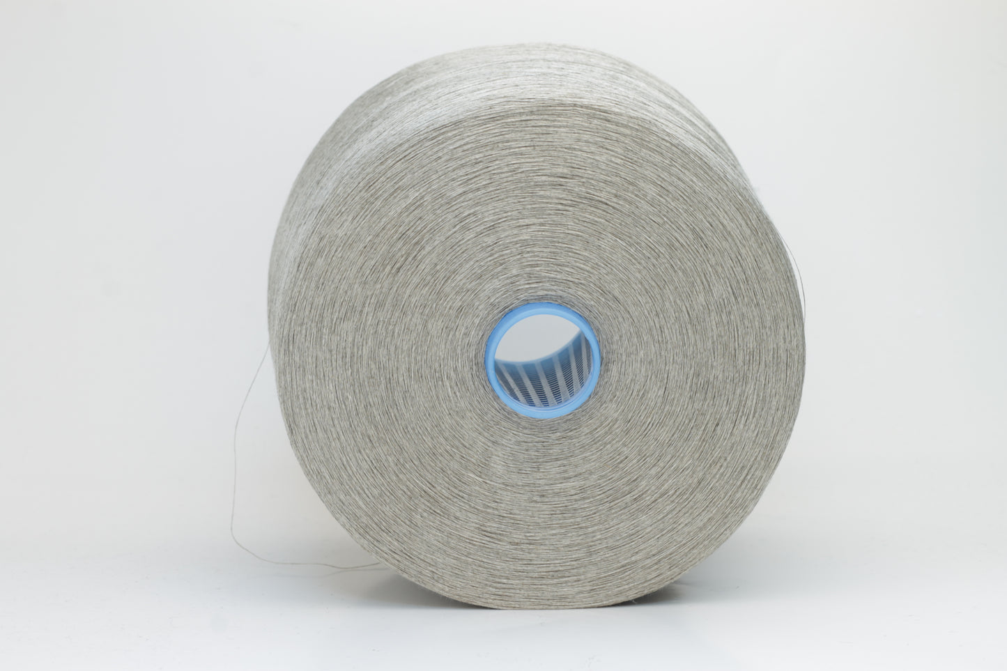 Fine, single-ply linen yarn in a rich charcoal gray. Reveals a crisp texture and subtle natural sheen, typical of pure linen fiber.
