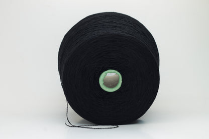 Luxurious black cashmere yarn, two-ply twist with a subtle sheen, displaying deep, consistent color and a fine, soft texture ready for crafting.