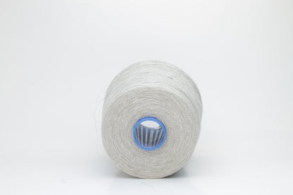 Fine, single-ply linen yarn in a rich charcoal gray. Reveals a crisp texture and subtle natural sheen, typical of pure linen fiber.