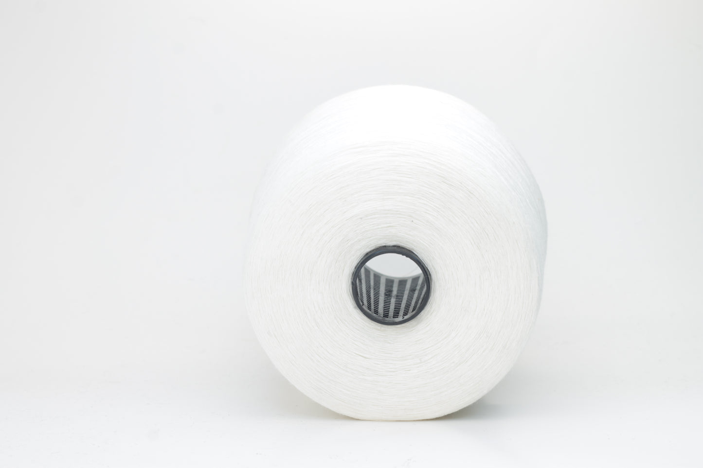 Fine, single-ply linen yarn in a rich White. Reveals a crisp texture and subtle natural sheen, typical of pure linen fiber.