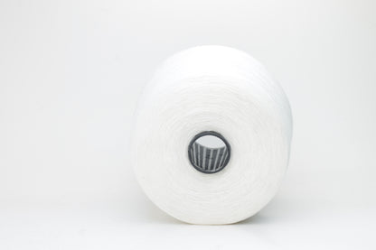 Fine, single-ply linen yarn in a rich White. Reveals a crisp texture and subtle natural sheen, typical of pure linen fiber.