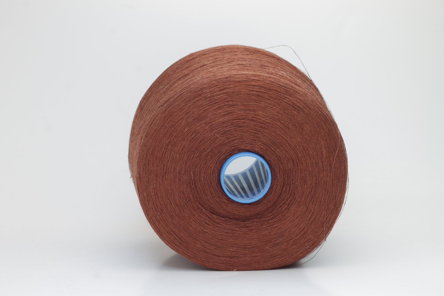 Fine, single-ply linen yarn in a rich Cacao. Reveals a crisp texture and subtle natural sheen, typical of pure linen fiber.