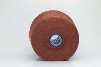 Fine, single-ply linen yarn in a rich Cacao. Reveals a crisp texture and subtle natural sheen, typical of pure linen fiber.