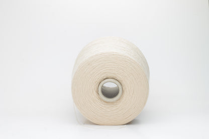 Close-up of luxurious Beige Merino wool yarn, two-ply twist with a soft, subtle sheen, and fine, consistent thread structure.