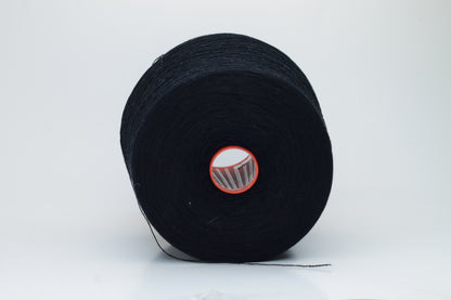 Close-up of a deep black, two-ply cashmere yarn, exhibiting a soft, even twist and a subtle, rich sheen under natural light, indicating its luxurious texture.