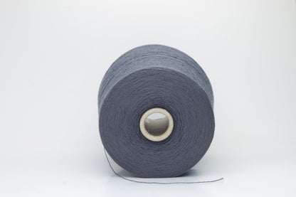 Close-up of luxurious Dark Gray Merino wool yarn, two-ply twist with a soft, subtle sheen, and fine, consistent thread structure.