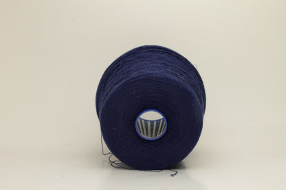 Rich, White 2-ply yarn with a fine, smooth twist; exhibits a subtle sheen and incredibly soft, uniform texture.