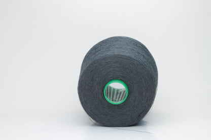 Fine, single-ply linen yarn in a rich Charcoal Grey. Reveals a crisp texture and subtle natural sheen, typical of pure linen fiber.