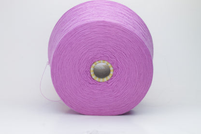 Close-up image showcasing a vibrant purple 100% merino yarn skein with a slight twist, revealing the fine ply structure and rich color depth; the fiber appears fluffy and soft.