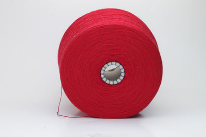 Close-up shot of vibrant red Zegna Baruffa Merino 100% Cashwool yarn, displaying a tight 2/30 Nm ply twist with deep color saturation and a slightly fluffy texture.