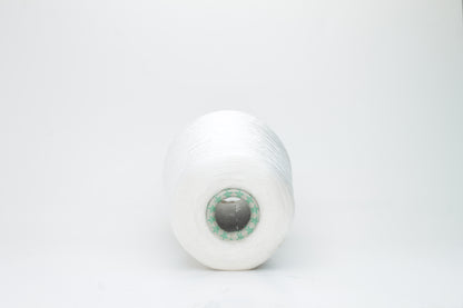 Close-up of brilliant white 100% silk yarn, single-ply strand with a smooth, highly lustrous surface, softly draped. Shimmering.