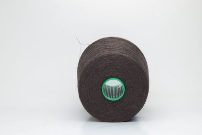 Fine, single-ply linen yarn in a rich Brown. Reveals a crisp texture and subtle natural sheen, typical of pure linen fiber.