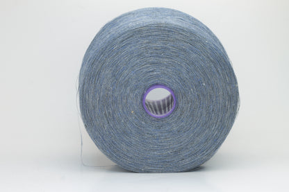Fine, single-ply linen yarn in a rich Denim. Reveals a crisp texture and subtle natural sheen, typical of pure linen fiber.