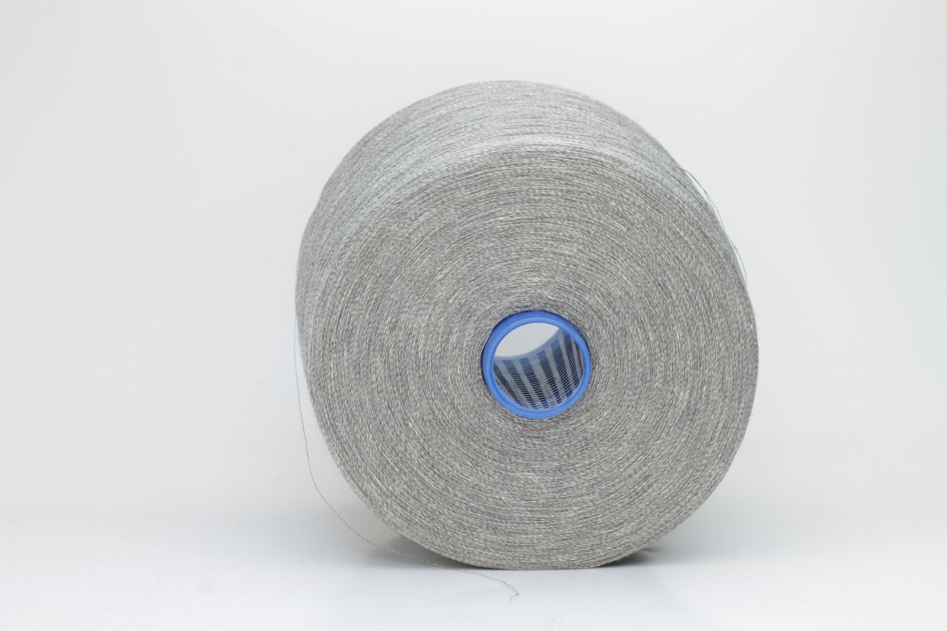 Fine, single-ply linen yarn in a rich charcoal gray. Reveals a crisp texture and subtle natural sheen, typical of pure linen fiber.